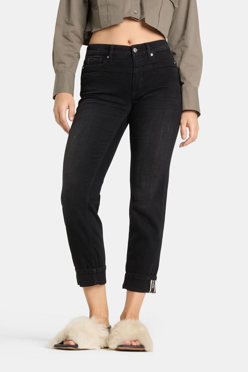 Jeans slim noir à revers