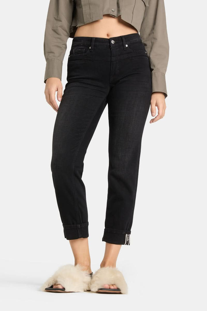 Jeans slim noir à revers