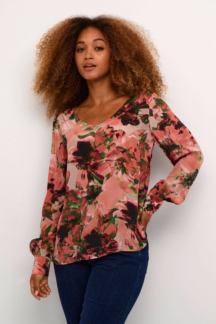 Blouse imprimée fleurs avec manches longues, encolure en V, coupe régulière, style élégant et décontracté.