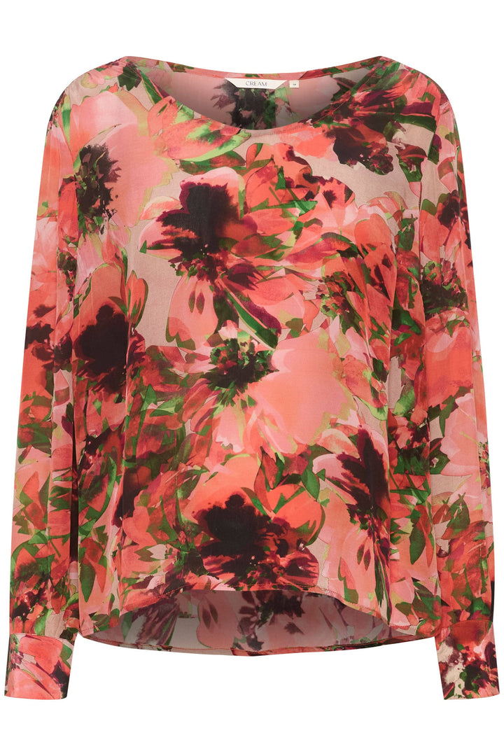 Blouse imprimé fleurs avec manches longues amples et encolure en V, coloris rose et noir.
