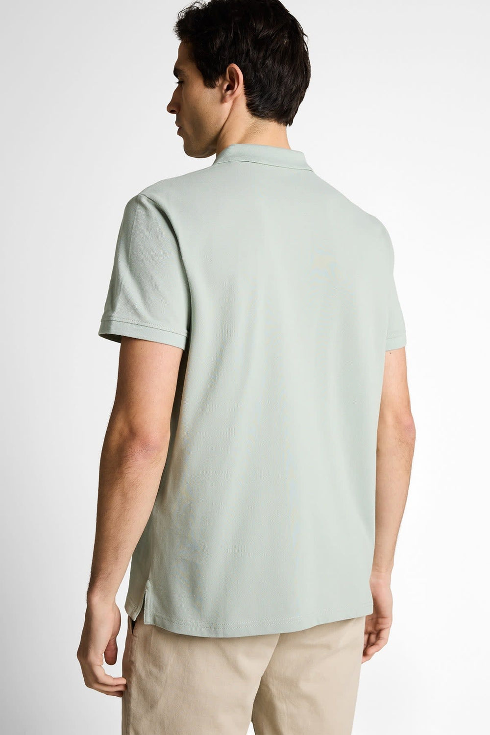 Front view of a white Tom Tailor men's polo shirt with logo and ribbed collar - Valérie Simon