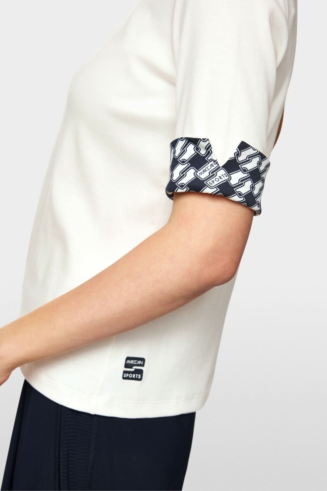 T-shirt en jersey avec encolure ronde et manches mi-longues à revers imprimés, style décontracté.