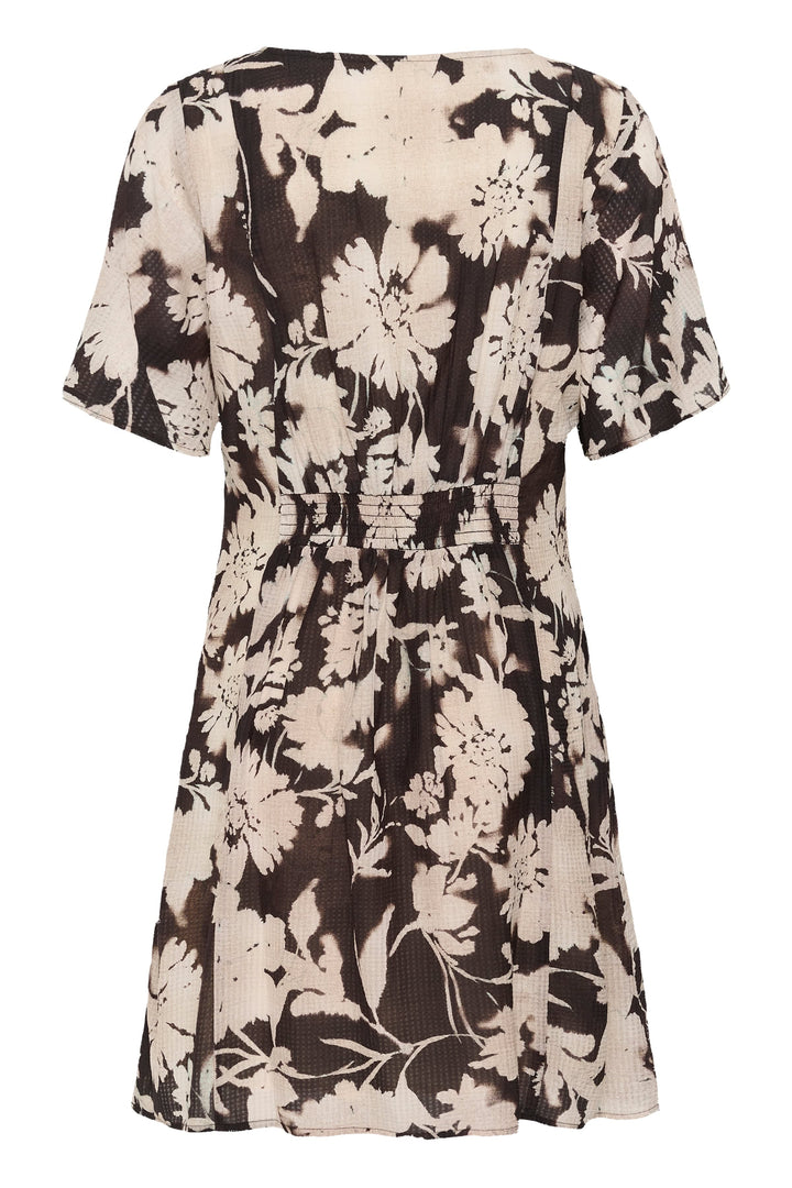 Side view of a short floral dress Cream for women in yellow with button details by Valérie Simon