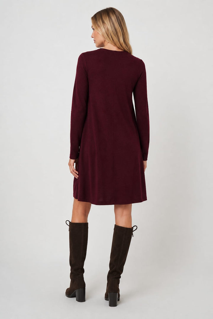 Front view of a flared knit dress Repeat Cashmere for women in beige, with knit details - Valérie Simon
