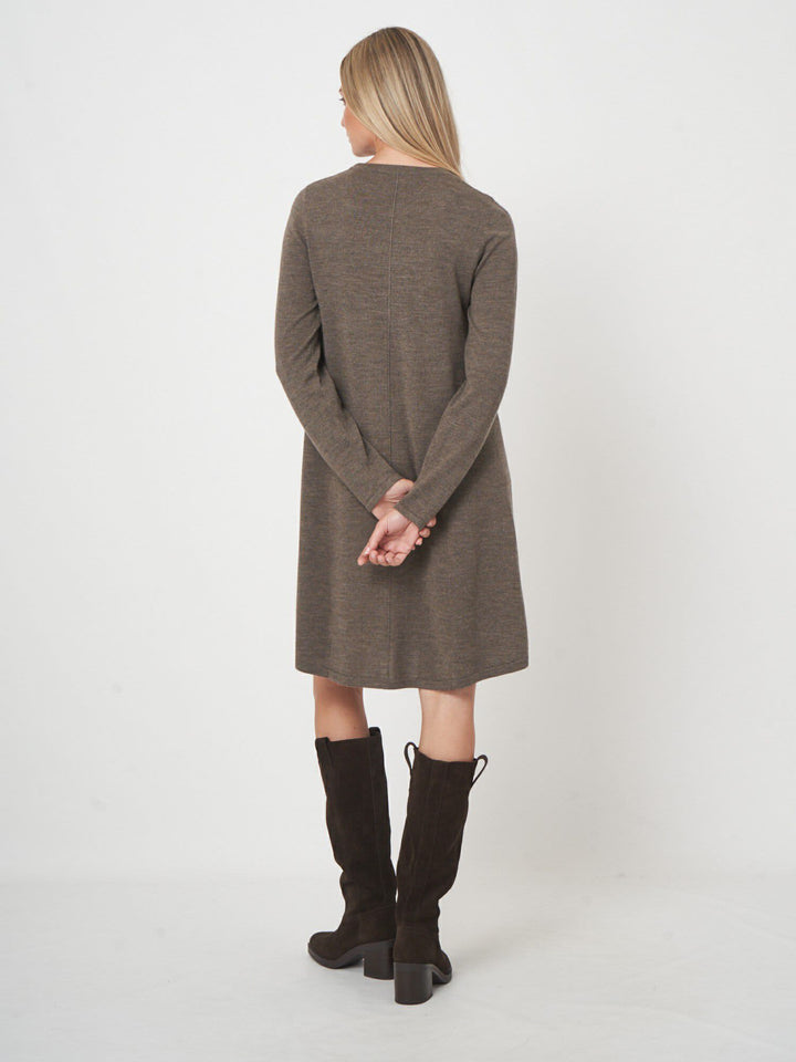 Front view of a flared knit dress Repeat Cashmere for women in beige, with a braided belt - Valérie Simon