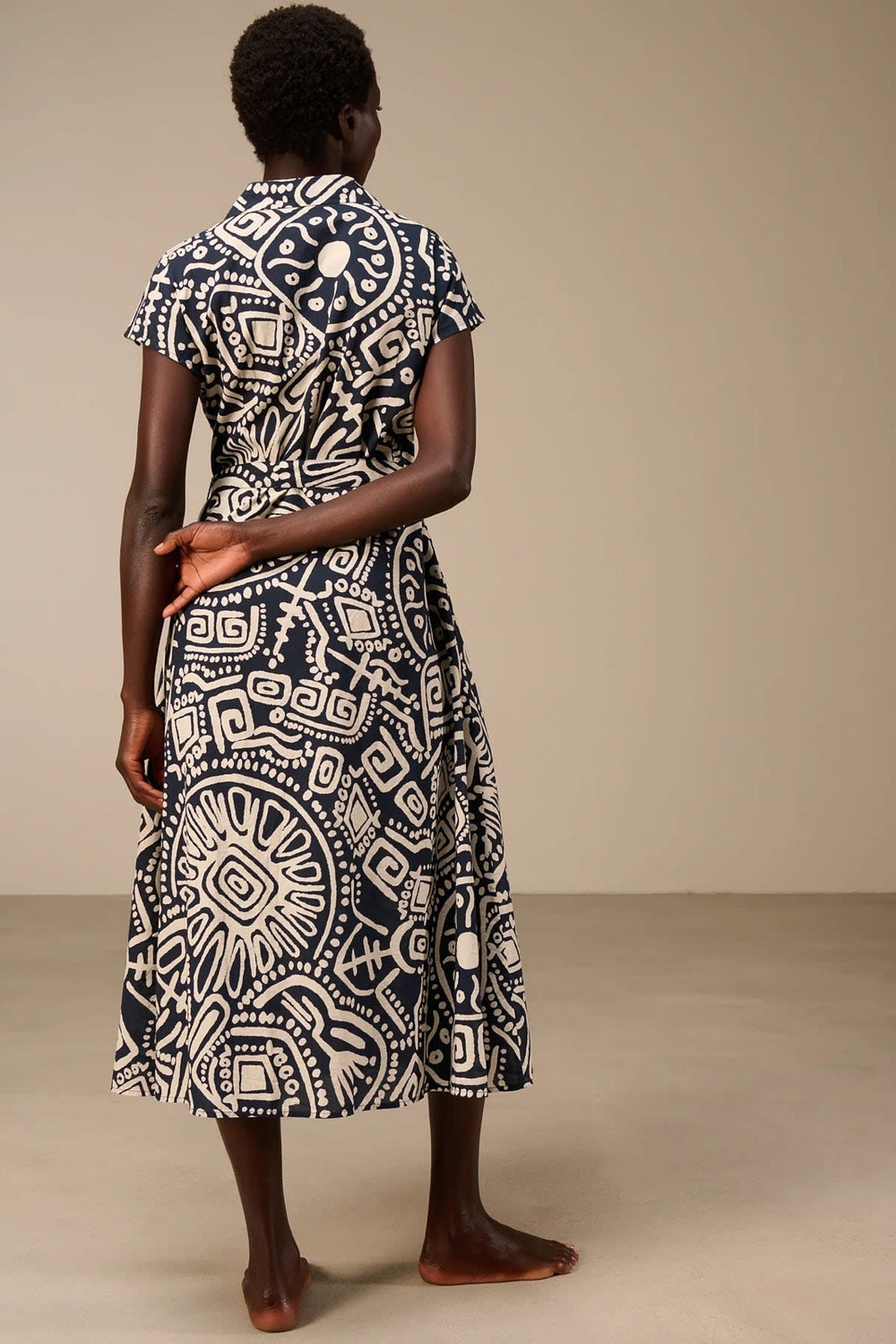 Rear view of a long, multicolored printed dress for women with floral patterns - Valérie Simon