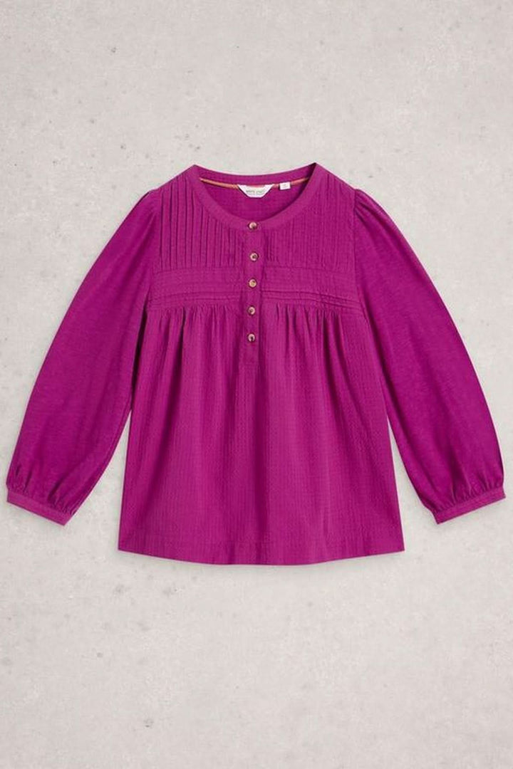Blouse plumetis à plastron froncé