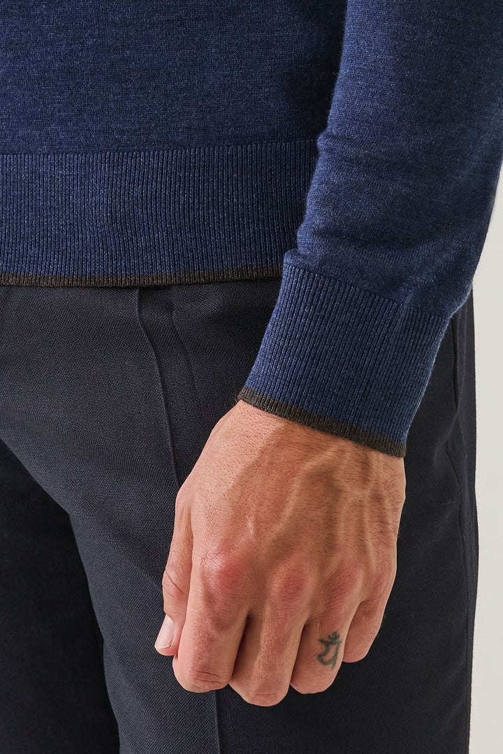 Polo boutonné en laine mérinos extra-fine