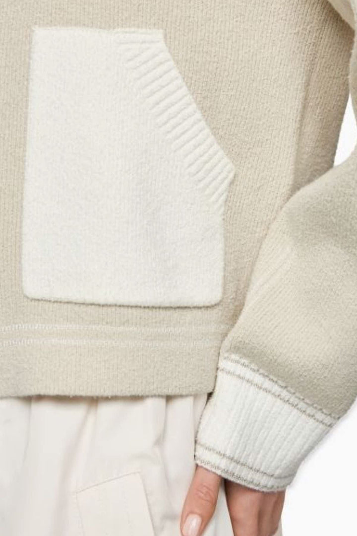 Front view of a beige, textured Marc Cain women&
