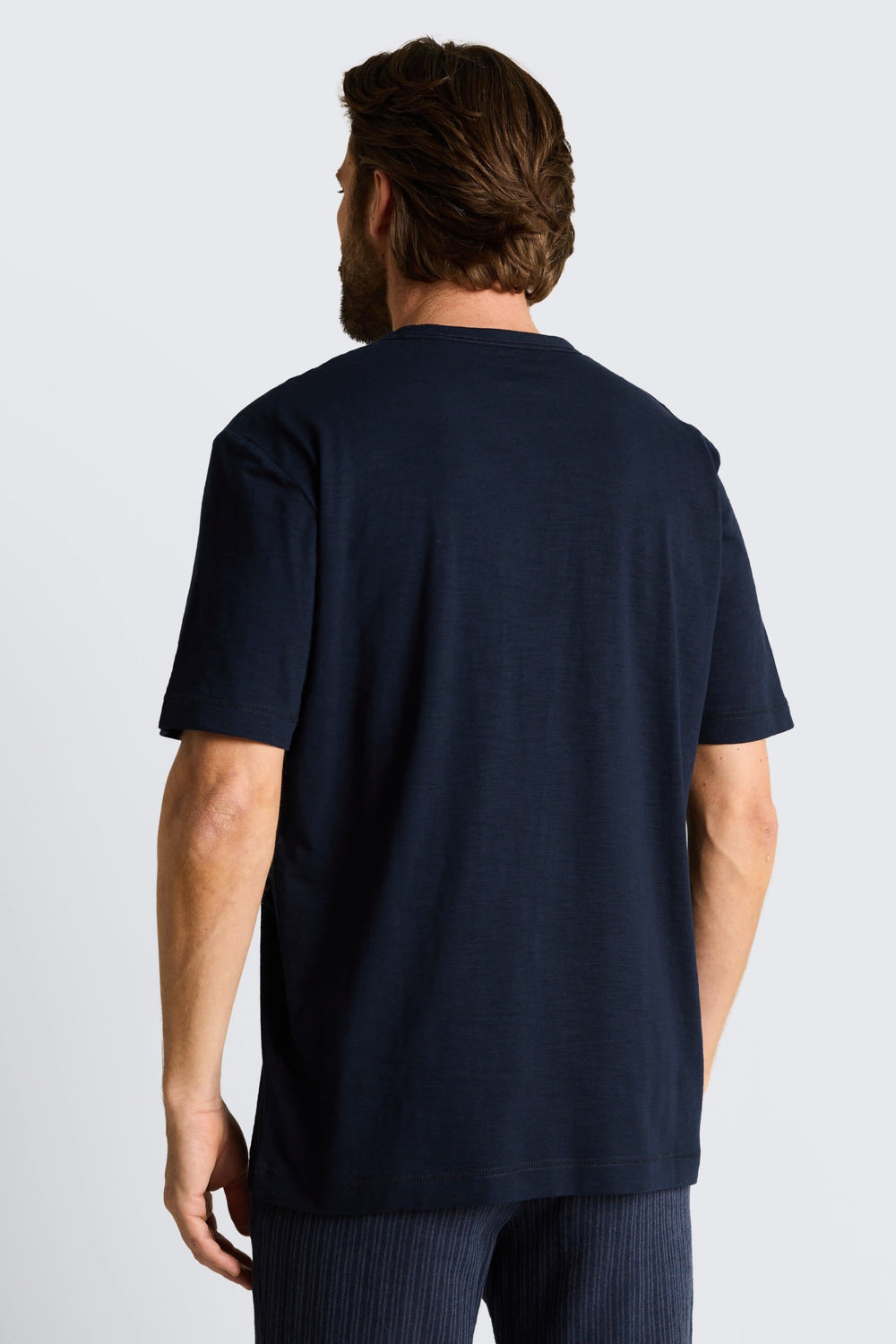Side view of a light blue, short-sleeved Tom Tailor men's T-shirt - Valérie Simon