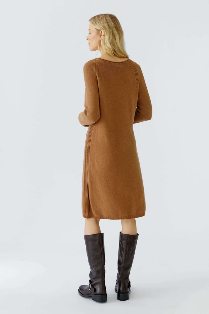 Robe tricotée à manches longues et poches plaquées