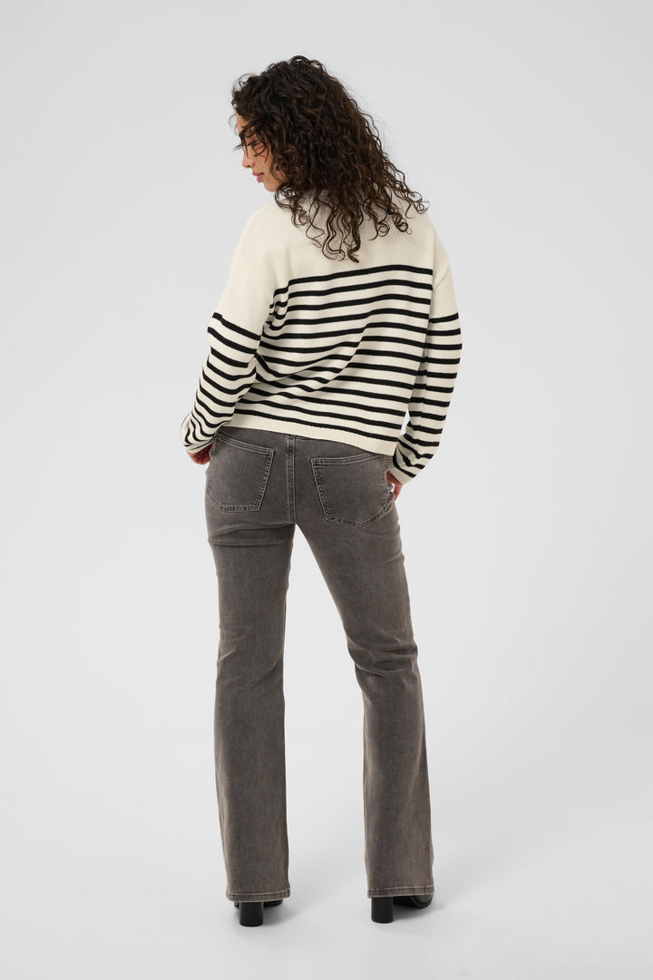 Front view of a striped knit top with "Kaffe" lettering for women in white and black - Valérie Simon