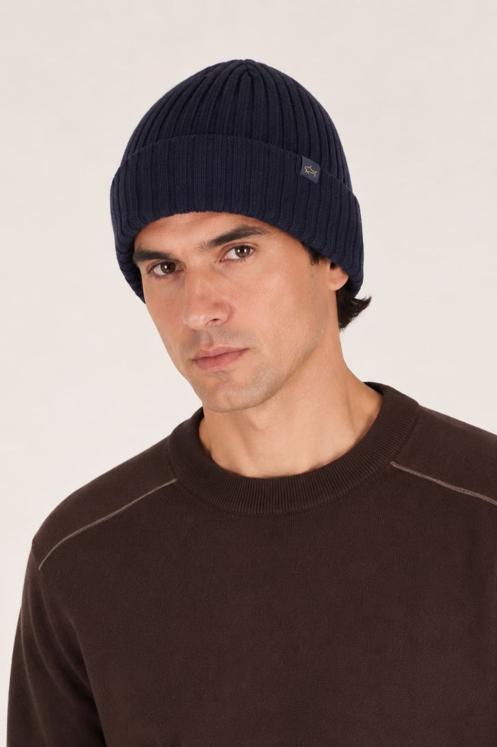Side view of a gray ribbed beanie for men featuring the Paul and Shark logo - Valérie Simon