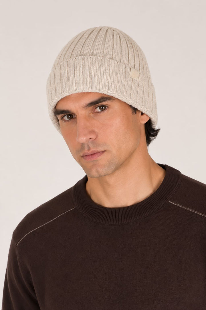 Front view of a black ribbed Paul and Shark beanie for men with an embroidered logo - Valérie Simon