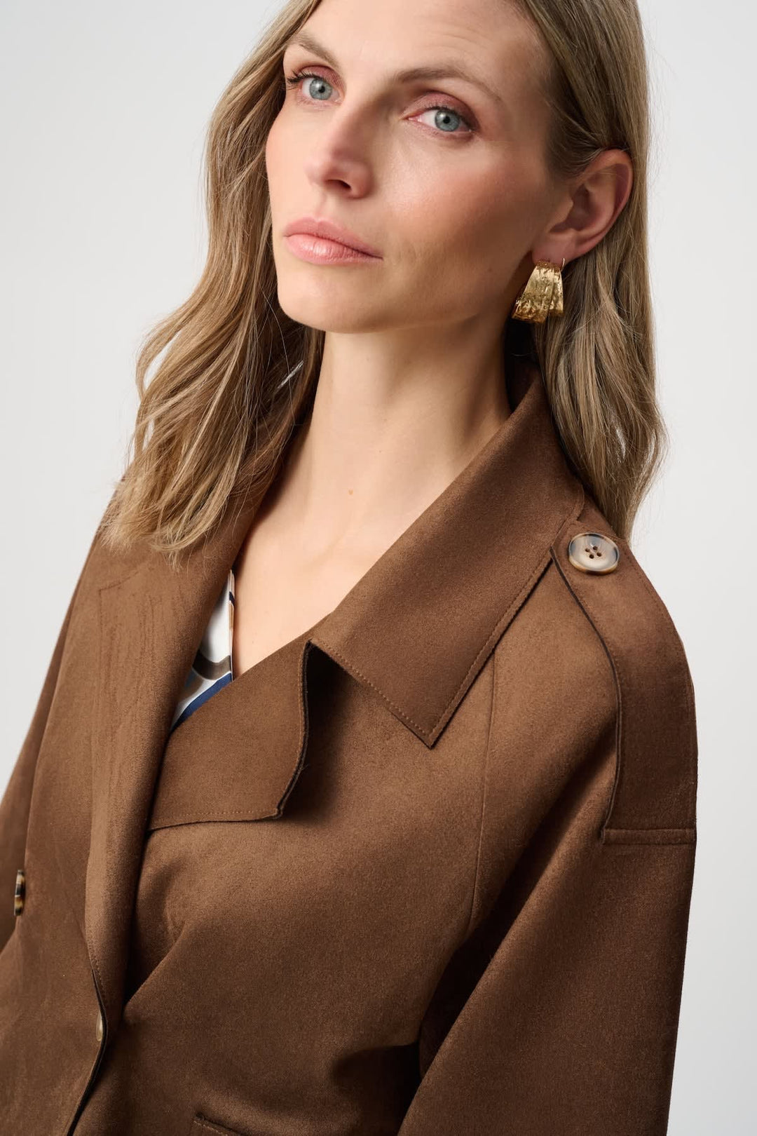 Front view of a short beige suede Joseph Ribkoff jacket with button details - Valérie Simon