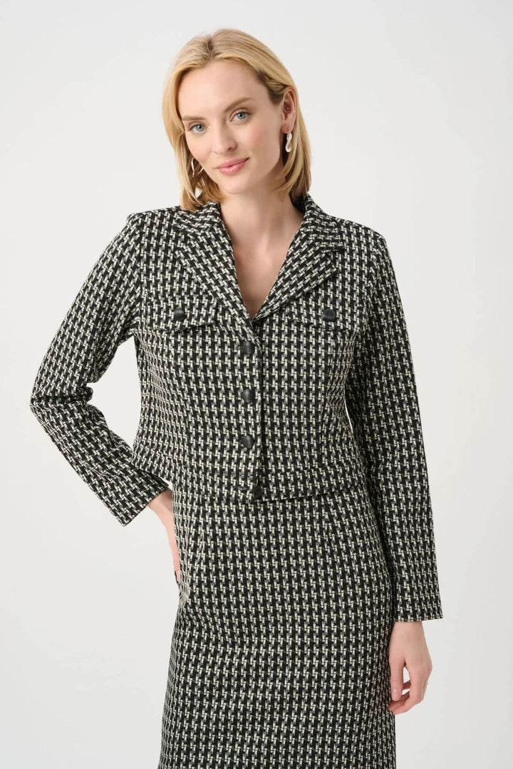 Front view of a short, textured blue Joseph Ribkoff jacket, with sleeve details by Valérie Simon