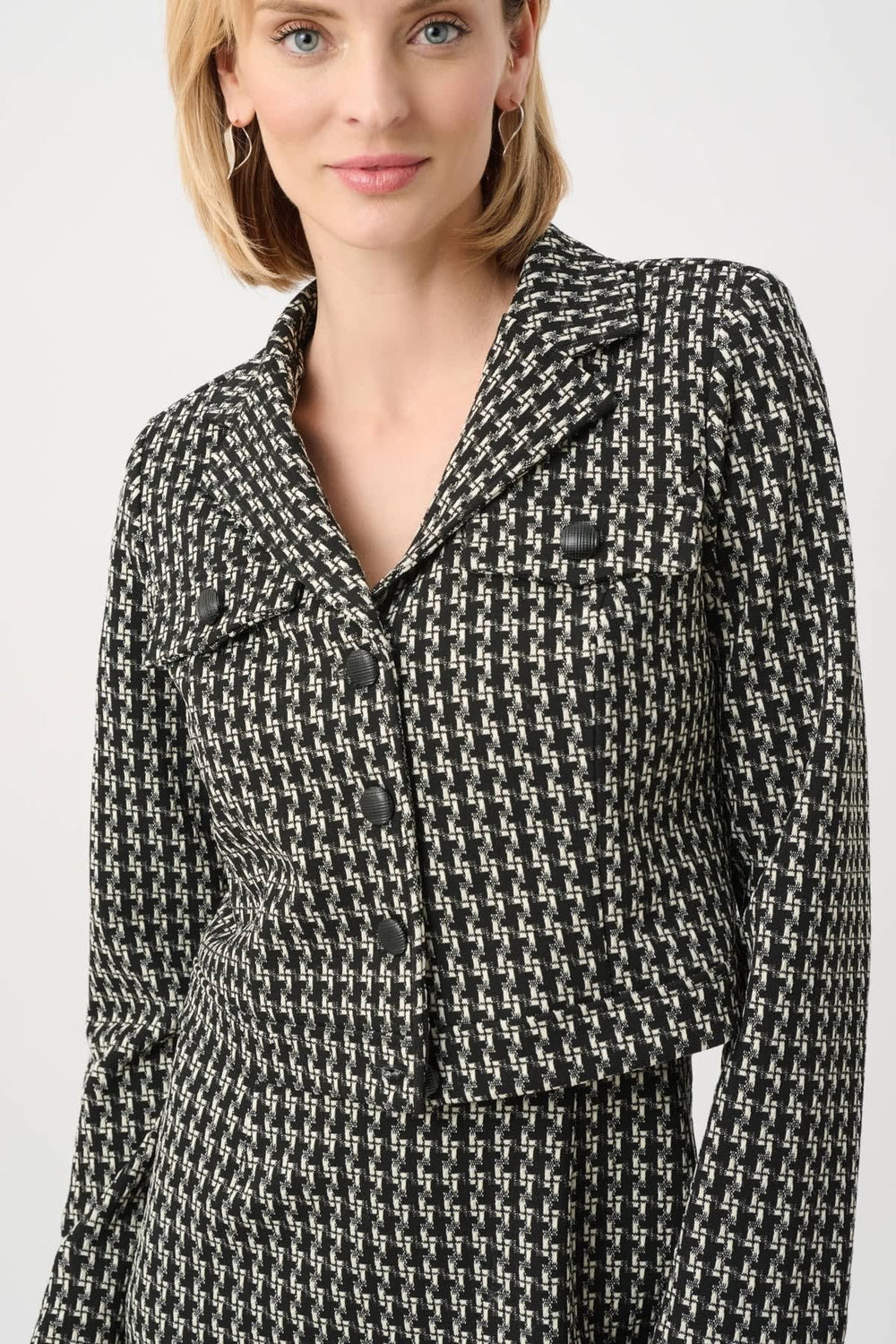 Front view of a short, black, textured-knit jacket by Joseph Ribkoff for women - Valérie Simon