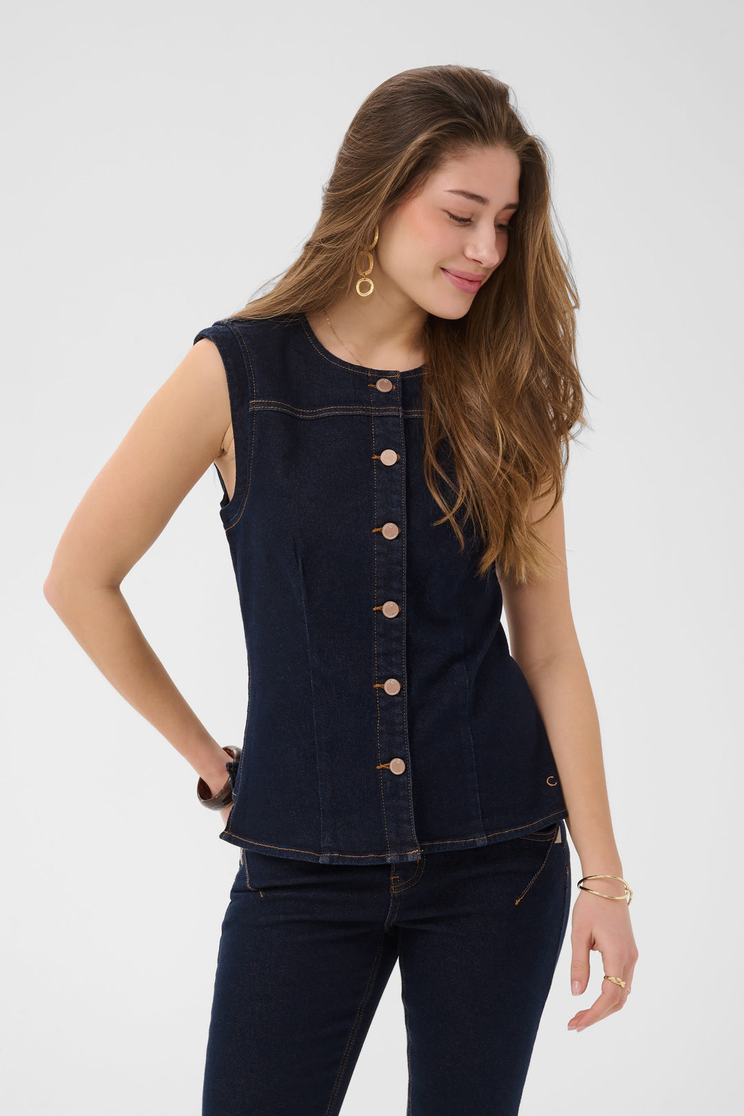 Side view of a blue denim sleeveless jacket Cream for women with buttons - Valérie Simon