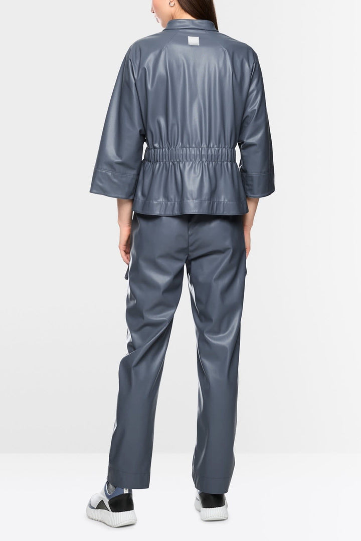 Side view of a black Marc Cain faux leather jacket for women with stitching details - Valérie Simon
