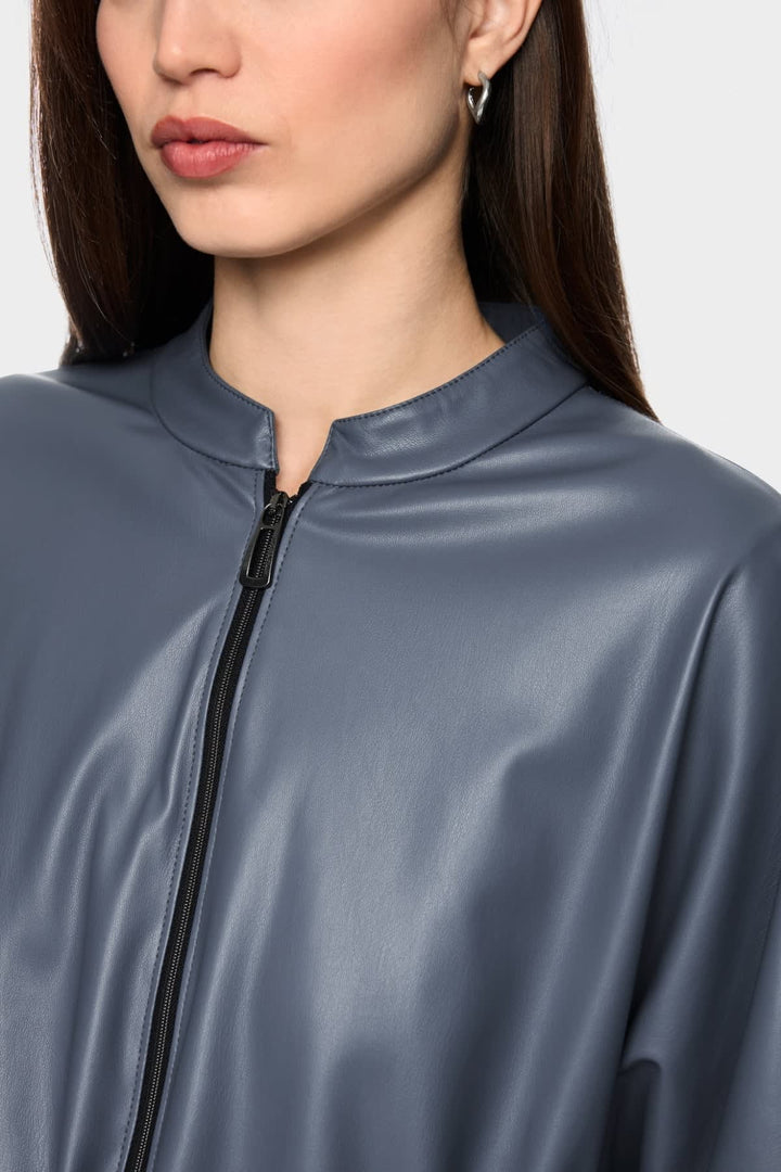 Front view of a black Marc Cain faux leather jacket for women, with zipper details - Valérie Simon