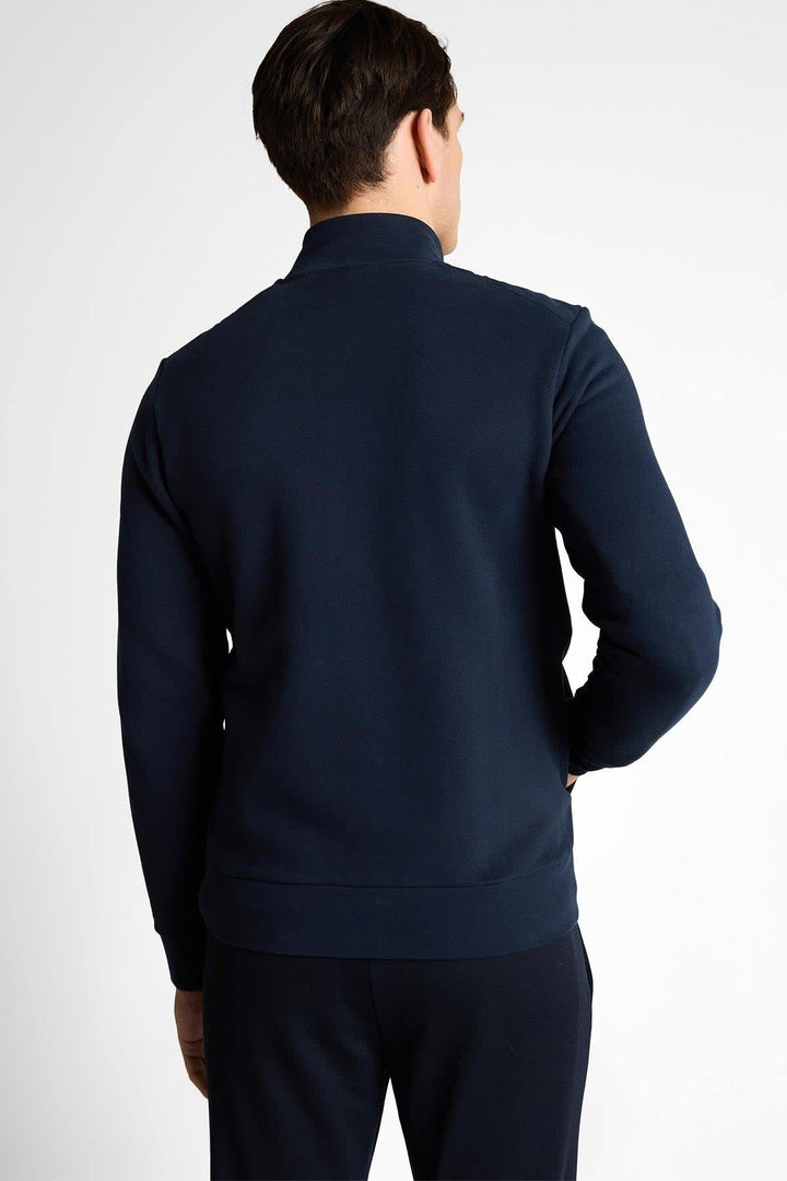 Vue de face veste hybride zippée Tom Tailor pour homme bleu avec détails matelassés - Valérie Simon