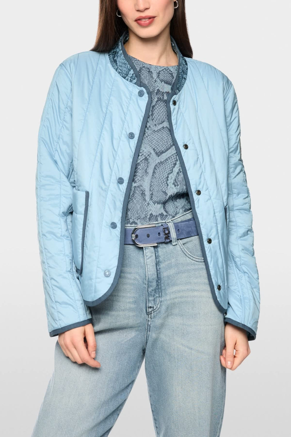 Front view of a black Marc Cain women's reversible jacket with a zipper - Valérie Simon