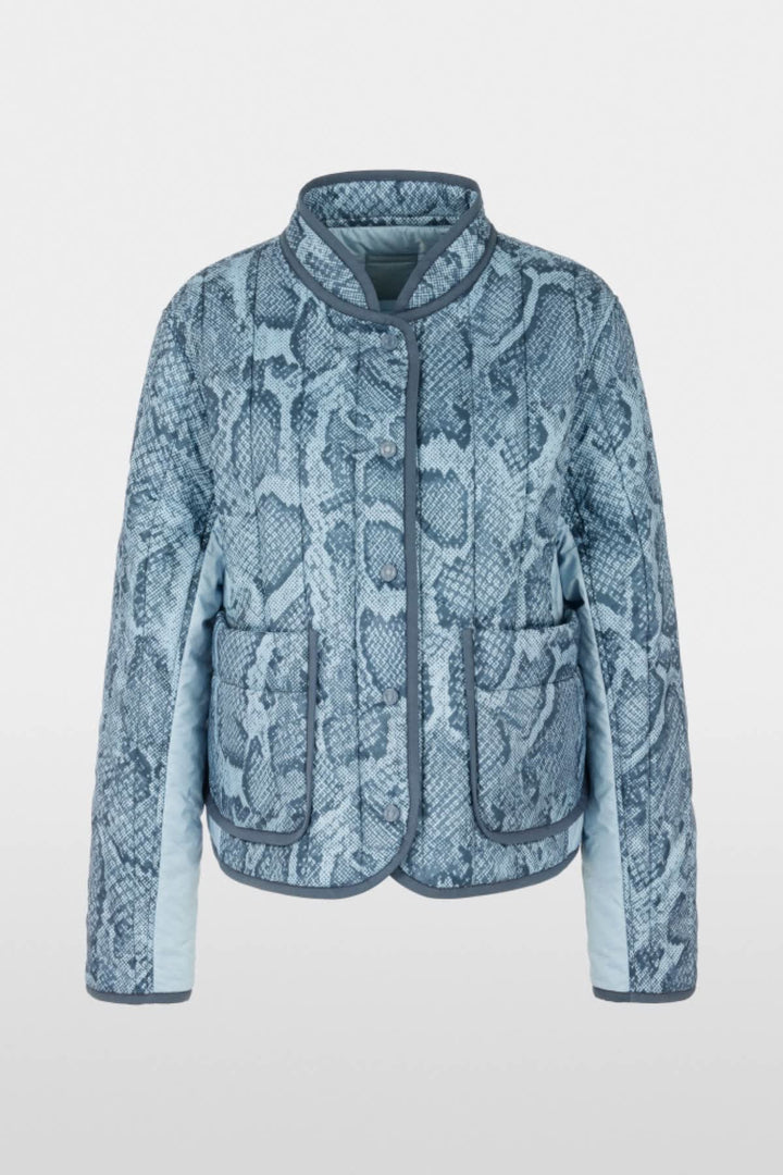 Front view of a reversible, beige, quilted Marc Cain women&