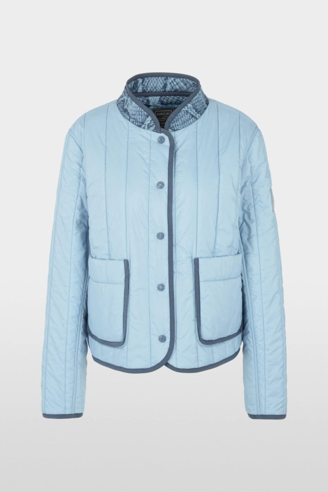 Side view of a blue Marc Cain reversible jacket for women with distinctive quilting - Valérie Simon