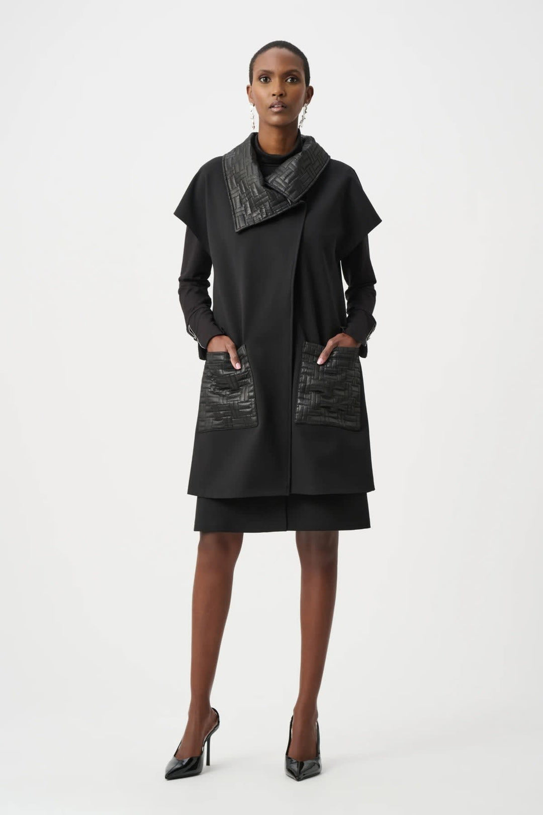 Front view of a black Joseph Ribkoff sleeveless jacket with a structured collar for women - Valérie Simon