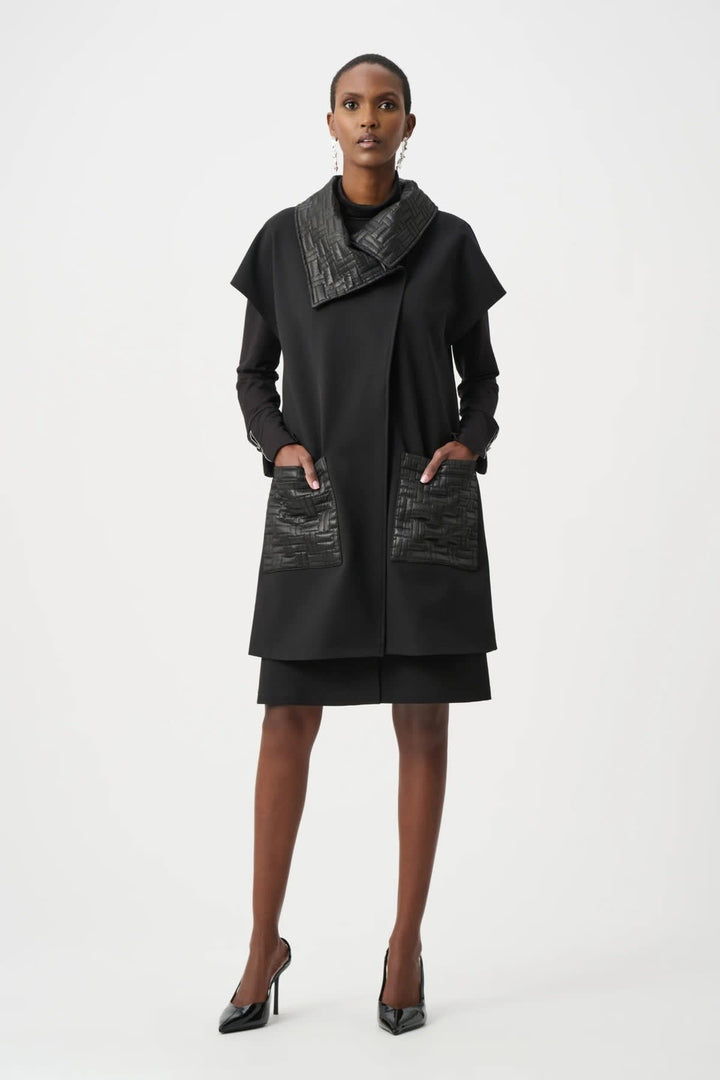 Front view of a black Joseph Ribkoff sleeveless jacket with a structured collar for women - Valérie Simon