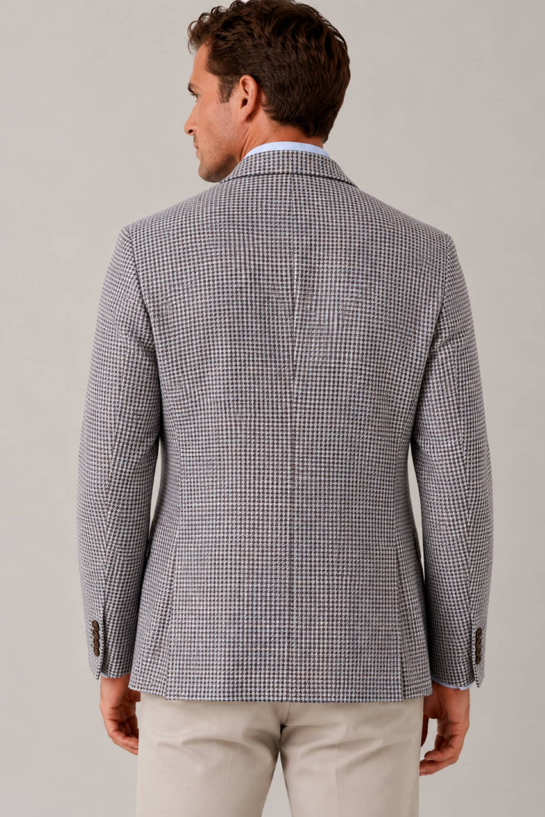 Vue de face veston Jack Victor à micro-motif texturé gris pour homme - Valérie Simon