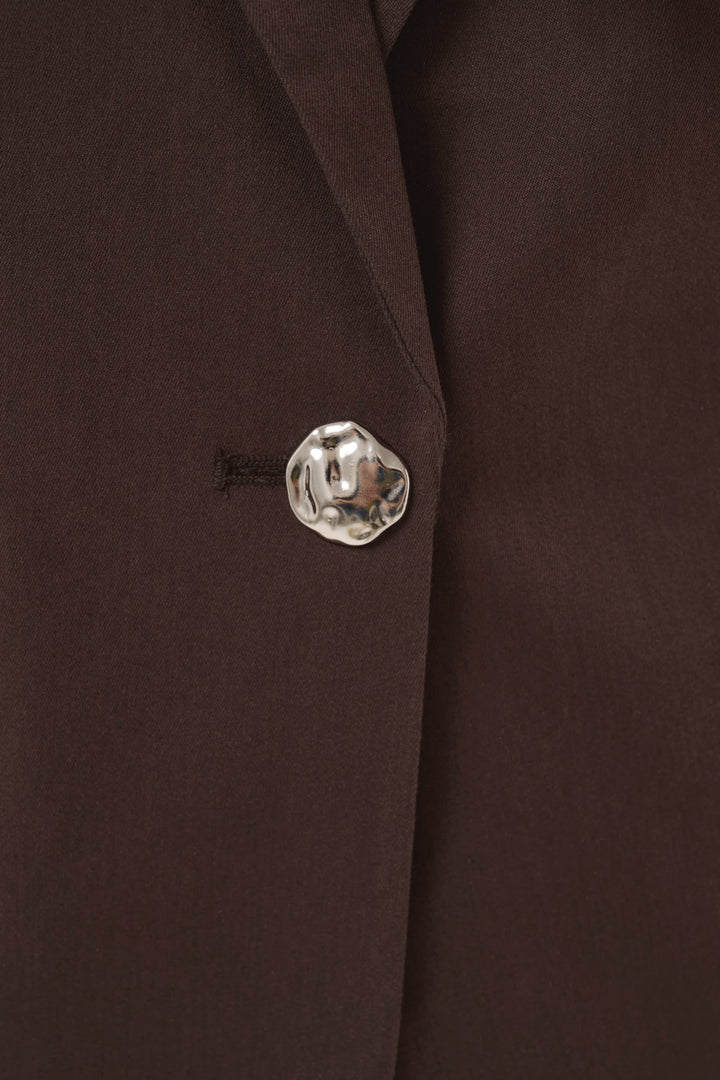 Front view of the Cream beige single-button women&