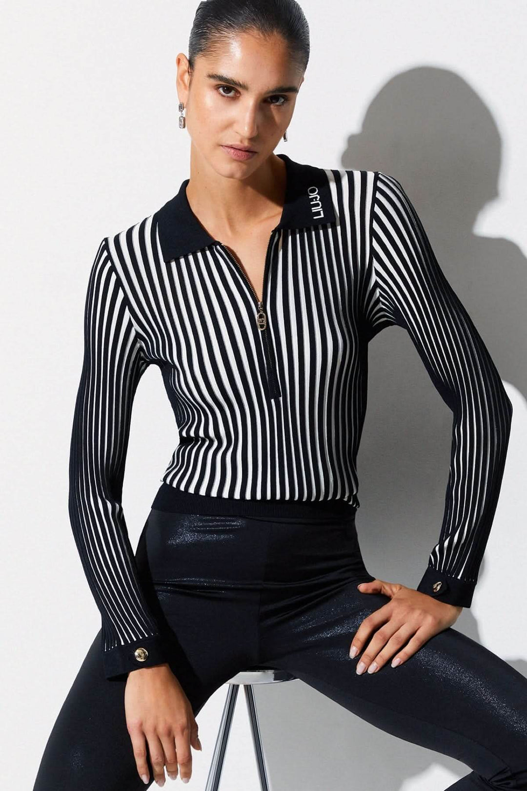 Polo en maille côtelée à demi-glissière