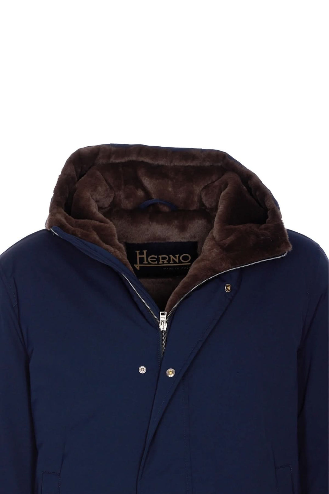 Manteau matelassé Herno avec capuche en fausse fourrure, offrant une allure urbaine et chaleur optimale.