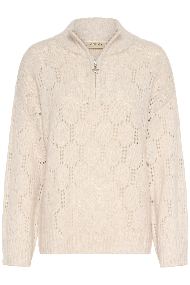 Chandail Zilla ajouré à demi-fermeture éclair en tricot texturé beige avec col montant pour style chic et douillet.