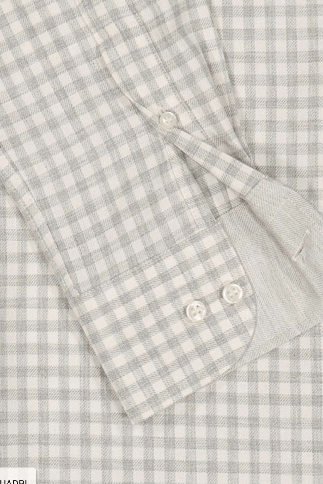 Chemise en flanelle à carreaux fins grise avec col boutonné et poignet ajusté.