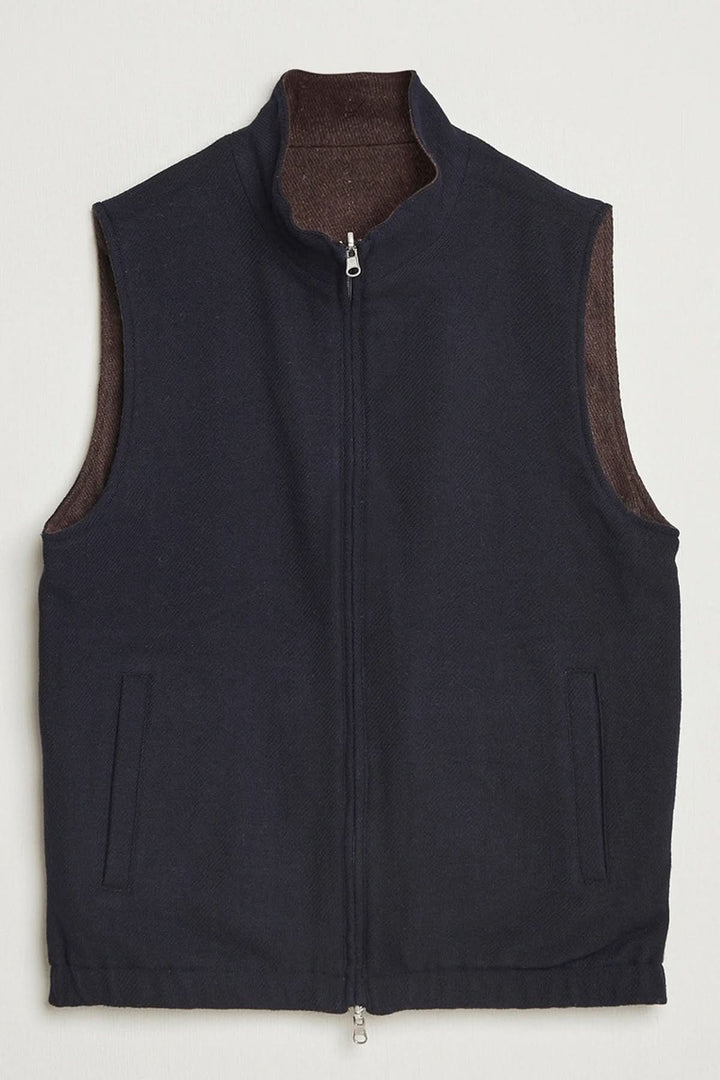Gilet en laine reversible Stenströms avec fermeture à double zip, poches fonctionnelles et confection élégante.