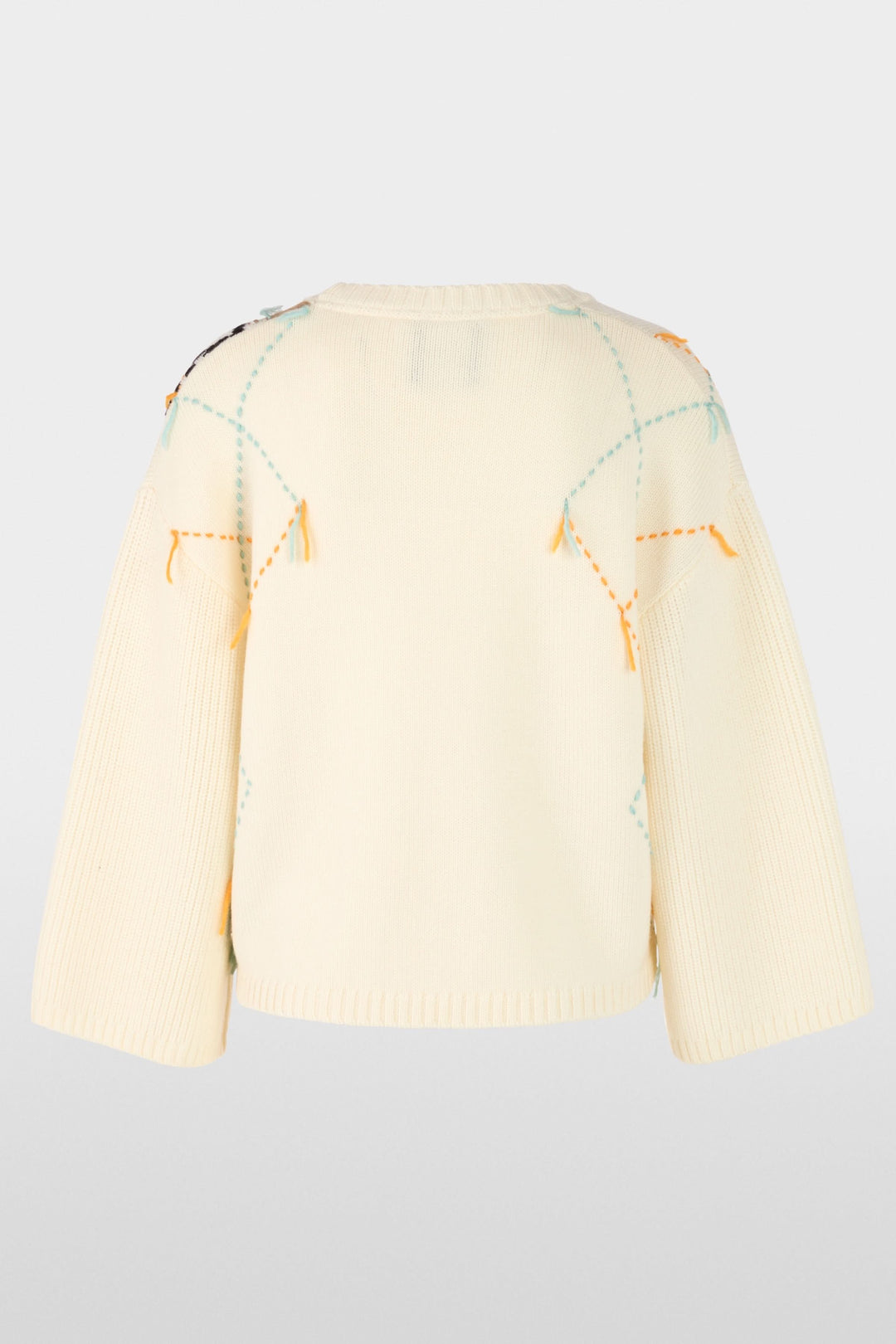 Chandail à motif losanges et accents léopard, vue arrière. Coupe ample, col rond, motifs texturés, détails modernes pour l'hiver.