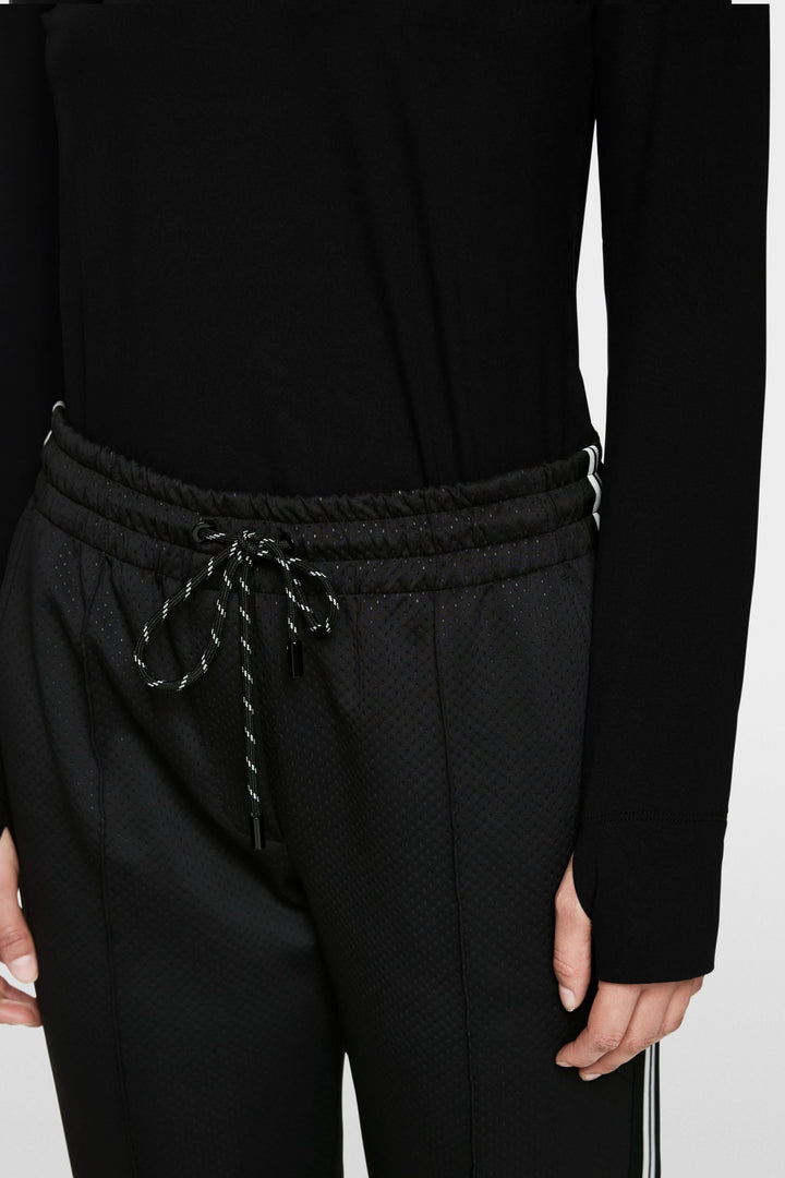 Pantalon Washington en noir avec taille élastique et cordon de serrage, idéal pour un look sportif-chic.