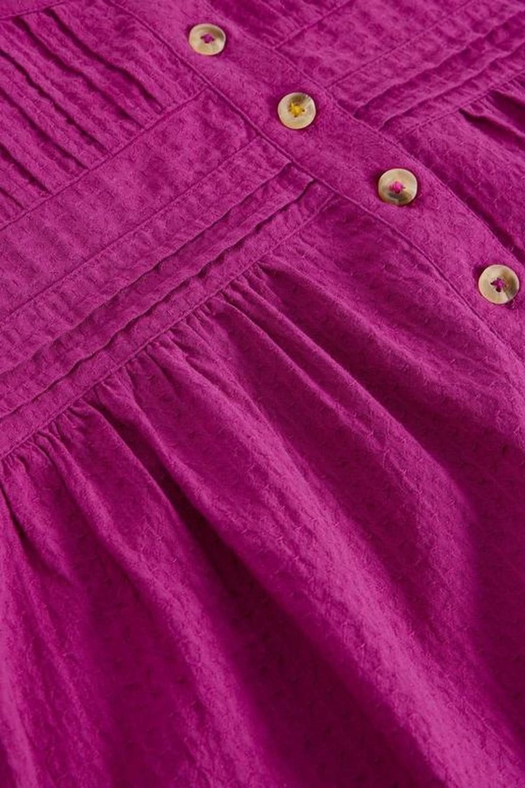 Blouse plumetis à plastron froncé