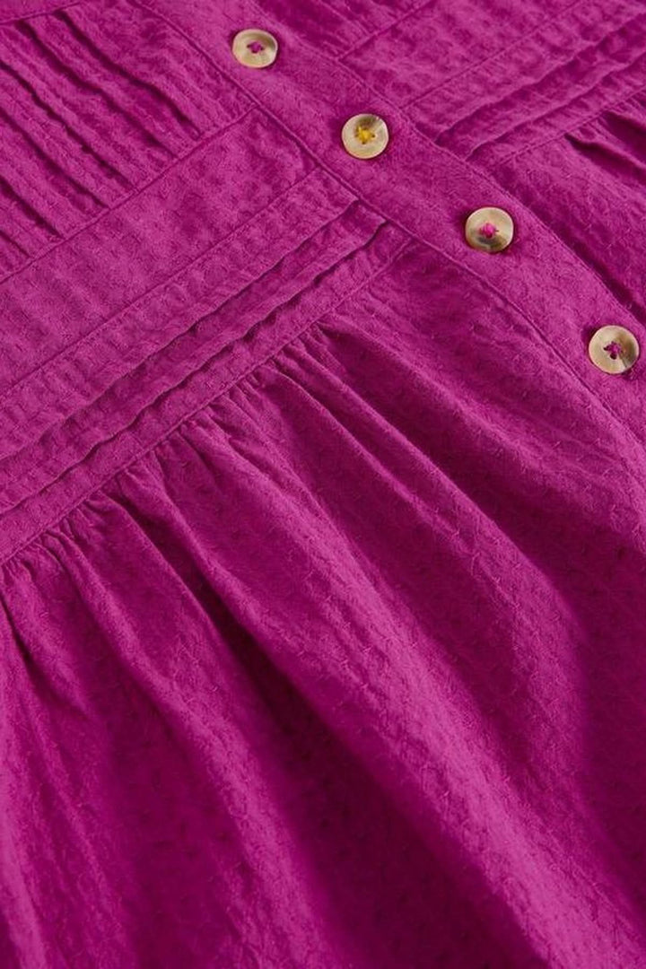 Blouse plumetis à plastron froncé