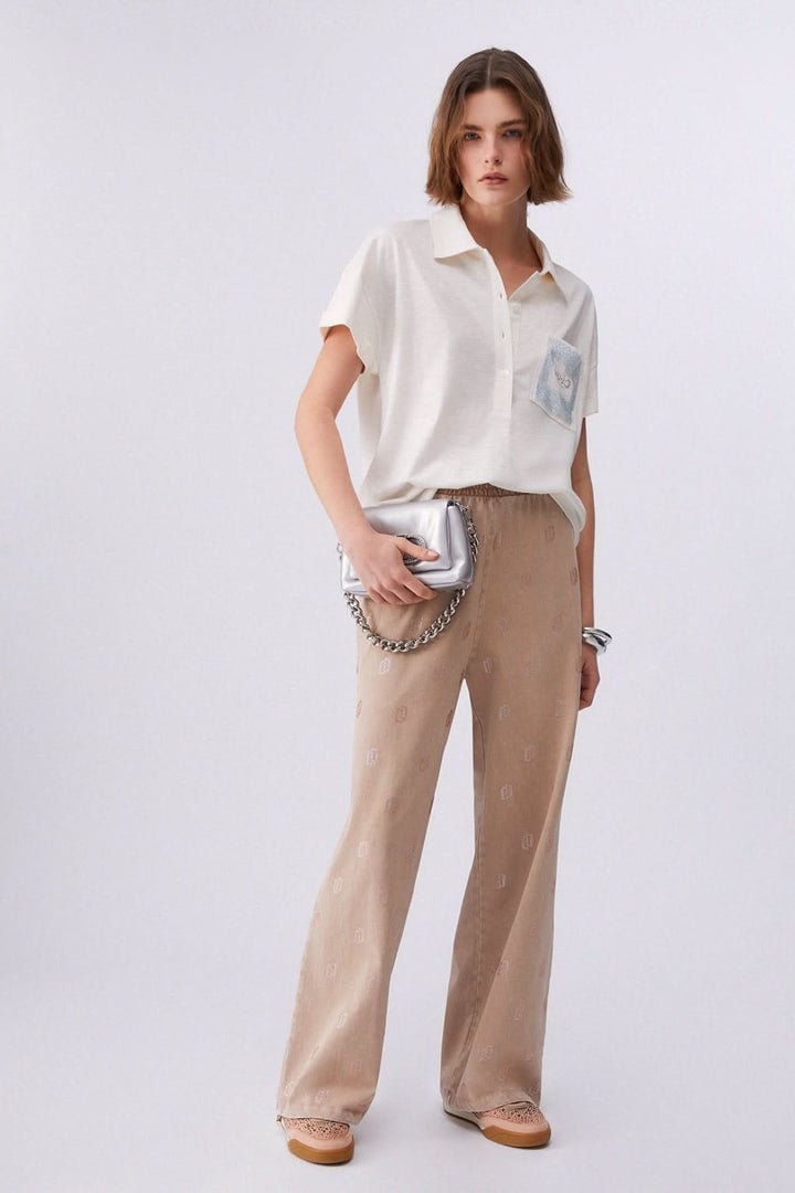 Polo à manches courtes avec poche décorative