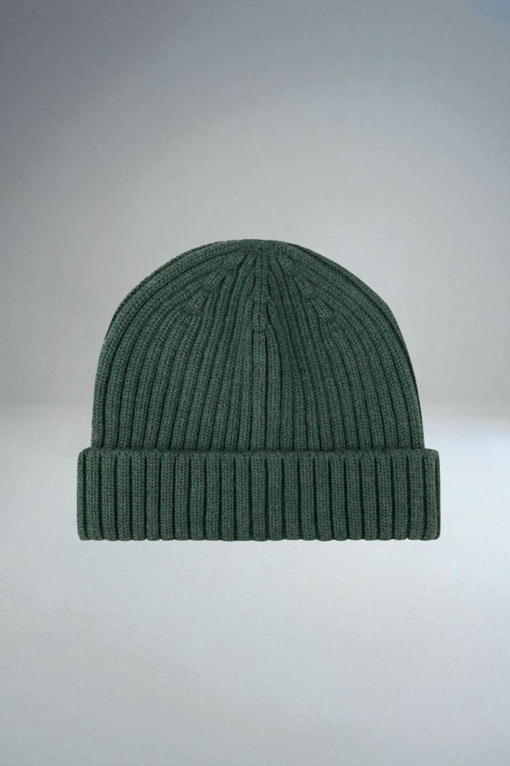 Tuque en laine mérinos côtelée verte, chaude et respirante, idéale pour l'hiver avec tricot côtelé classique et revers large en haut.