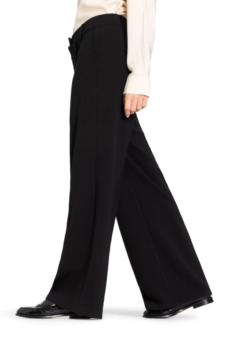 Pantalon Anais à jambe large, moderne et fluide, idéal pour le bureau ou le quotidien.