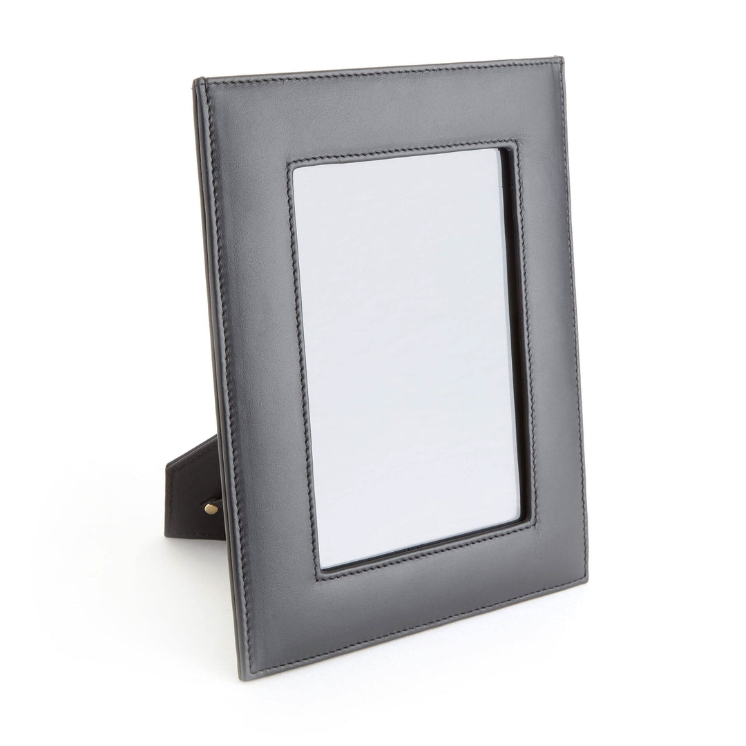 5" x 7" leather picture frame with rear drop-down door for easy photo access.