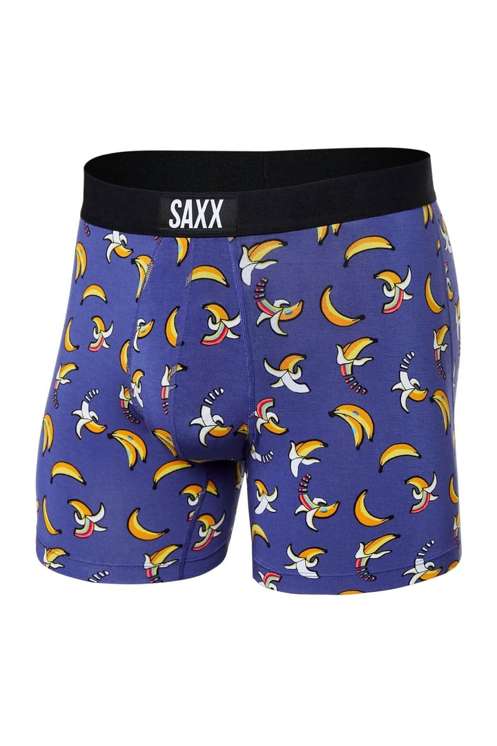 Boxer homme à motif bananes colorées sur fond bleu, slim fit, tissu doux et respirant.
