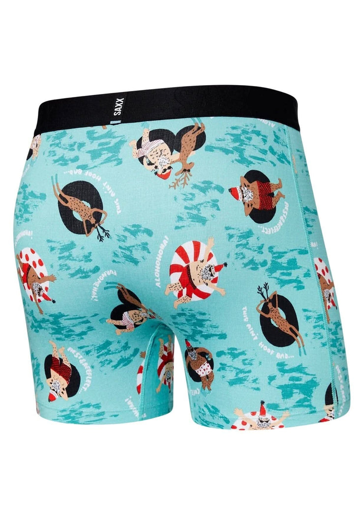 Boxers color aqua avec motifs humoristiques de Père Noël et rennes pour un look festif et amusant.