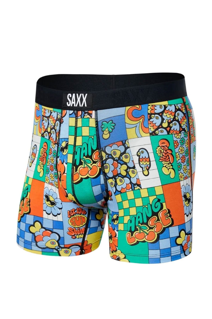 Boxer SAxx coloré avec motifs psychédéliques et inscription "Hang Loose", parfait pour un look décontracté.