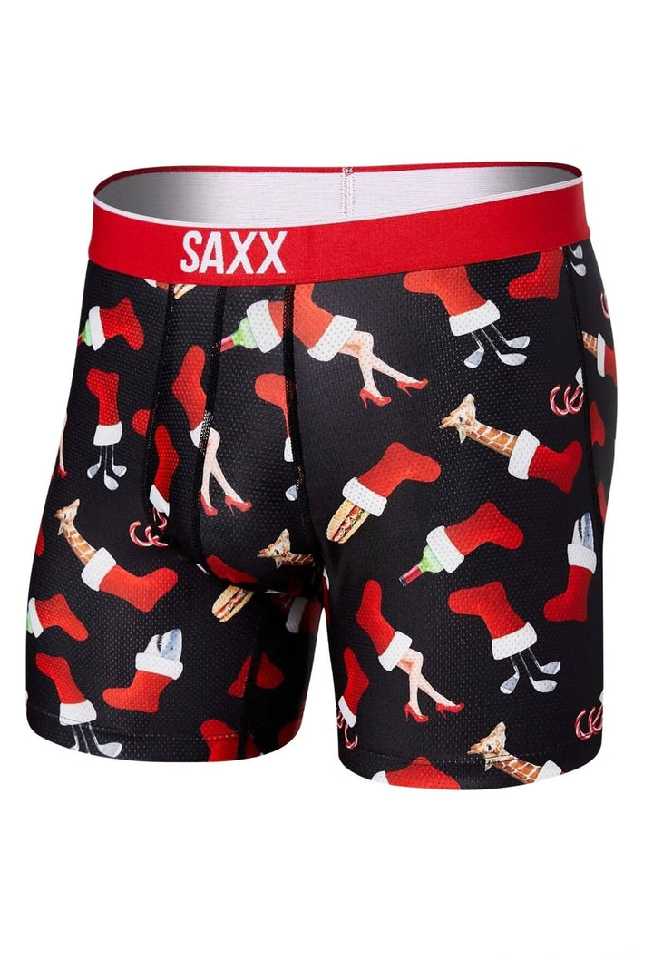 Boxer de Noël SAXX, motif festif de chaussettes, parfait pour vos séances d'entraînement confortables.