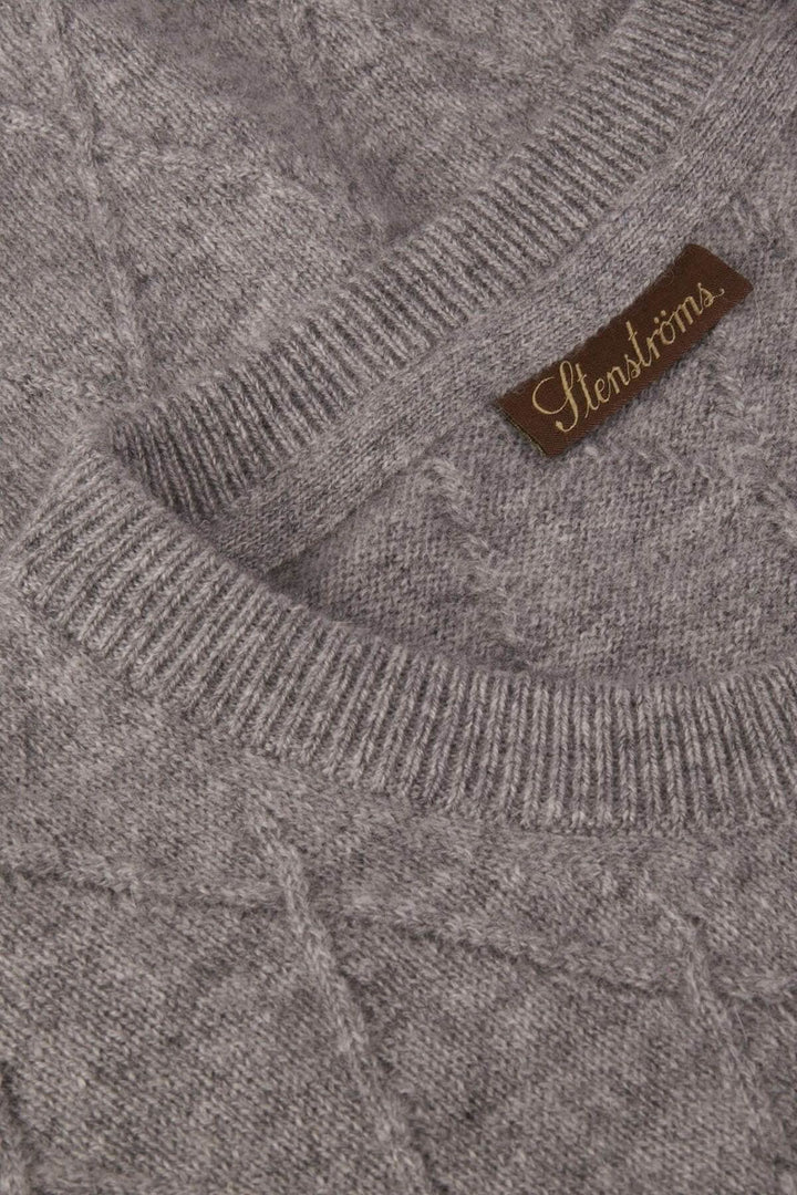 Chandail en cachemire texturé Stenströms avec col rond et tricotage Harlequin.